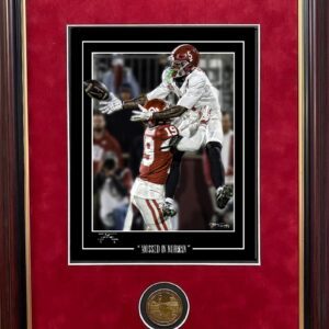 Mossed in Norman, Bernard catch framed with coin